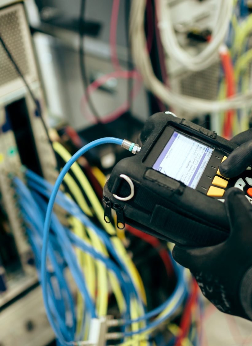 Technician repairing cmts cards